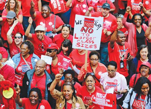 Chicago teachers took to the streets of downtown to demand a fair contract