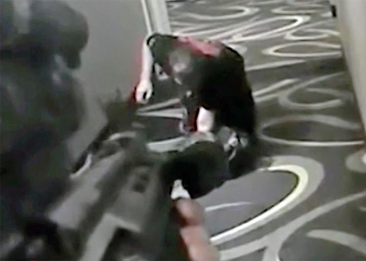 Police in Arizona murdered a man in a hotel hallway as he crawled on his knees