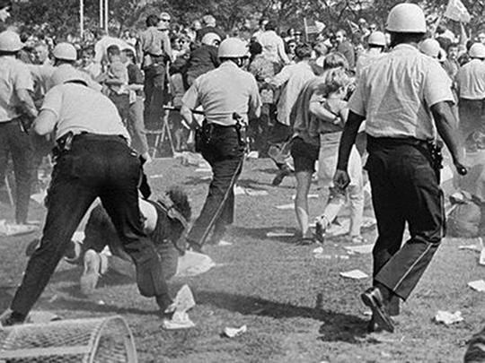 Chicago police assault antiwar protesters during the 1968 Democratic convention