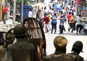 Protesters demanding "azadi" confront riot police on the streets of Jammu in Kashmir