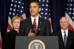 President Barack Obama, flanked by Secretary of State Hillary Clinton and Defense Secretary Robert Gates