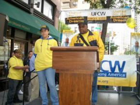 Members of UFCW Local 1500 in New York City announce the settlement of their new contract in July