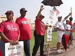 Mott's strikers hold down the picket line outside the Williamson, N.Y., plant