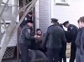 A demonstrator protesting the eviction of Catherine Lennon and her family is arrested