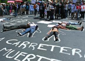 Supporters of the indigenous marchers rally in Cochabamba against the government's road project