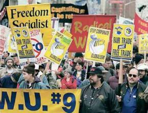 Global justice demonstrators march against the WTO in Seattle