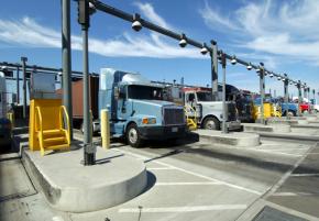 Trucks pass through the gates at the Port of Los Angeles