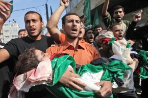 Residents of Gaza City carry the victims of the Israeli assault on Palestinians