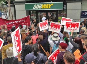 Striking workers and their supporters in Seattle took the streets in front of fast-food restaurants