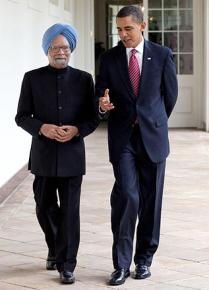 Indian Prime Minister Manmohan Singh walks with Barack Obama