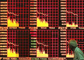 Indicators of China's stock market on a Shanghai street