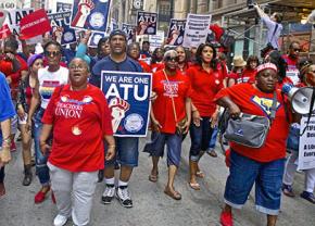 Chicago teachers, transit workers and community members march for a just city