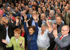 Die Linke representatives and supporters celebrate election results in Berlin