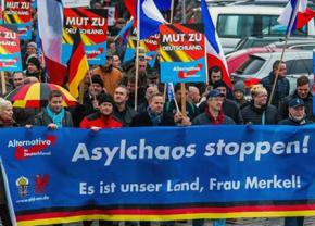 Supporters of Alternative for Germany march against asylum for refugees in Leipzig
