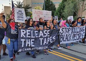 Protesters march to demand justice for Keith Lamont Scott