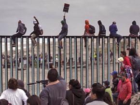 Welcoming members of the migrant caravan as they reach the border at Tijuana