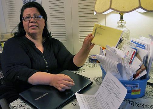 A low-wage worker struggles to cover her bills