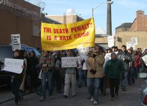 Anti-death penalty demonstrators march outside Baltimore's Supermax prison in December 2005