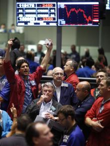 Traders watch as the stock market plummets during "Black September"