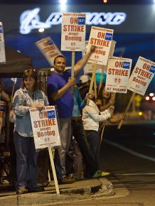 Striking Boeing workers on the picket line outside the Everett, Wash., factory.