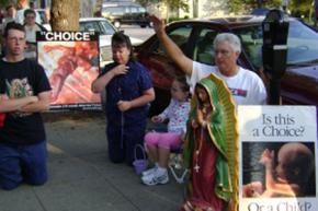 Anti-choice protesters harass patients at the only abortion clinic in Louisville, Ky.