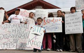 Pilsen parents and community members rally outside the field house they're fighting to save