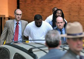 James Cromitie and David Williams being escorted to their arraignment in May