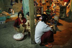 An extended family living in a cramped space in the Indonesian capital of Jakarta