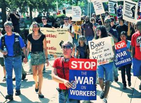 Protesters march in support of labor at Occupy Austin
