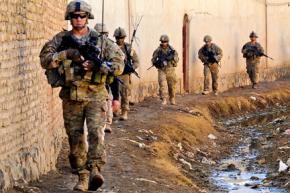 U.S. troops on patrol at a Department of Public Works facility and water distribution point in Kandahar