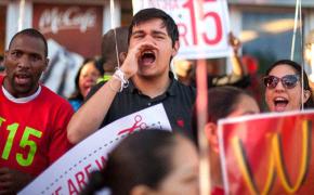 Low-wage workers and their supporters rally outside a McDonalds
