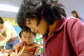 Kindergarten students focus on desk work
