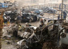 Wreckage left behind after a car bombing in Baghdad