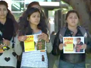 Supporters rally with Leobardo Meza outside a San Diego McDonald's
