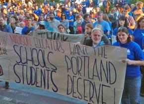 Madison High School teachers at the front of the crowd outside Portland Public Schools headquarters