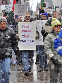 Wisconsin workers march against Gov. Scott Walker's union-busting and budget cuts