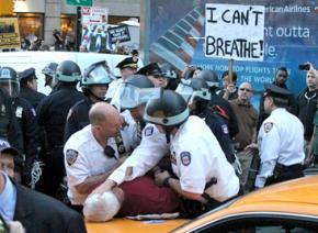 New York police piling on a protester at a march in solidarity with Baltimore's uprising
