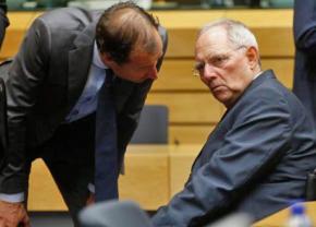 German Finance Minister Wolfgang Schäuble (right) with another Eurogroup minister who dictated austerity to Greece