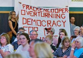 Environmental justice activists protest Colorado's fracking governor