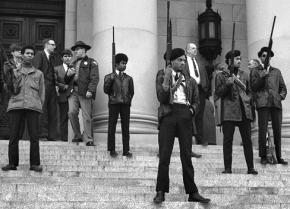 Black Panthers protest outside California's Capitol building against a gun control law aimed at them