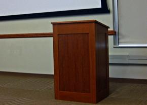Empty podium in a college lecture hall