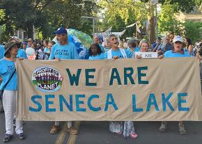 Climate activists march against fossil fuel development in Seneca Lake, New York