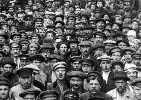 Factory workers in Petrograd pose for a photograph after an organizing meeting