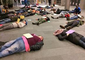 Activists stage a "die-in" in Seattle's City Hall to protest homelessness