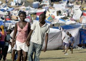 Haitians take refuge in a tent camp in the aftermath of the earthquake