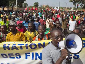 Workers take part in mass demonstrations in Burkina Faso during the 2014 Burkinabé uprising