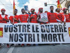 Migrant workers march in Rome against racist violence