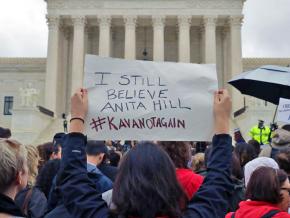 Protesters demand justice for Anita Hill outside the Supreme Court