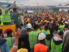 Construction workers protest conditions at a site for a new airport in Istanbul