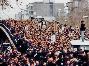 Thousands take part in a mass demonstration during the Iranian revolution